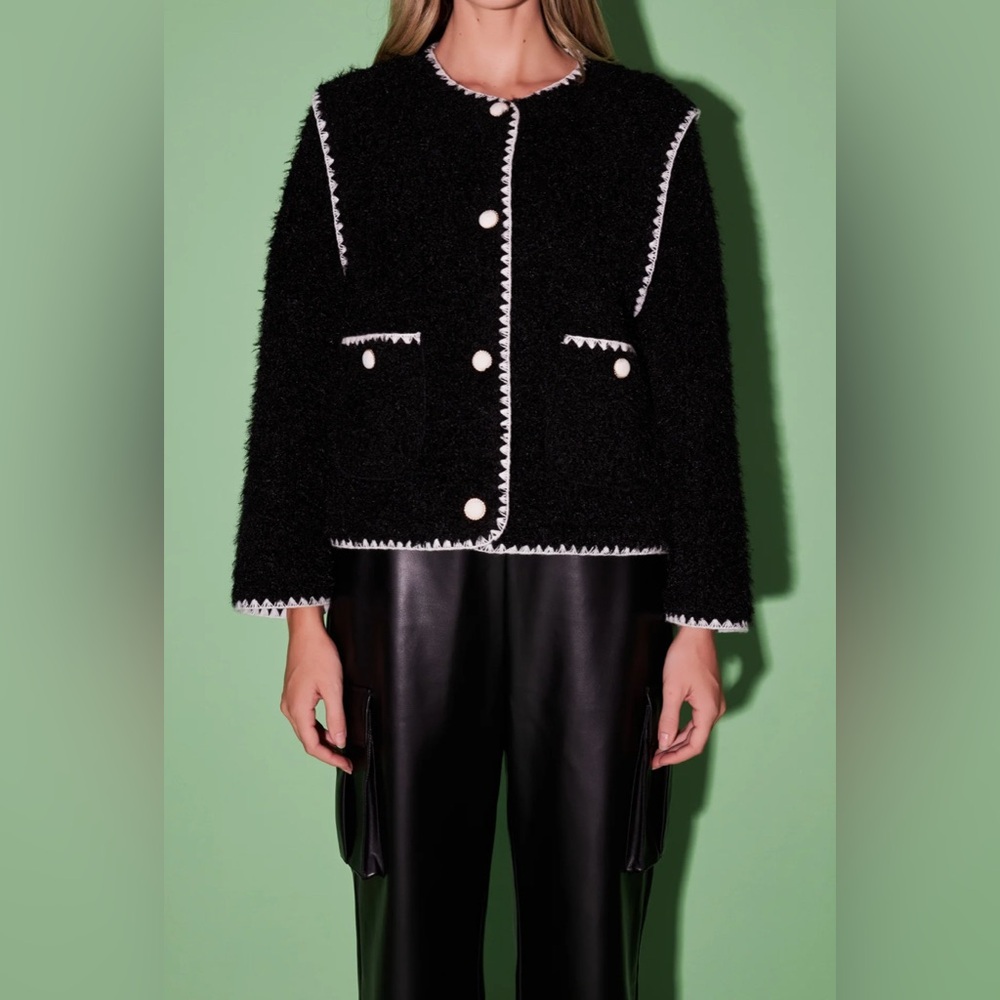 Black Teddy/Sherpa Jacket with cream whipstitch border